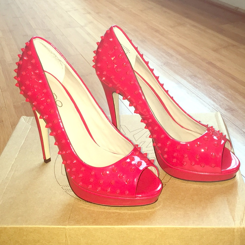 Red Aldo peep-toe pumps